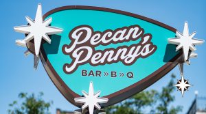 Outside the restaurant, a throwback sign in teal, brown and white, with “Pecan Penny’s” in script, alerts visitors that there is indeed great BBQ in downtown Columbus